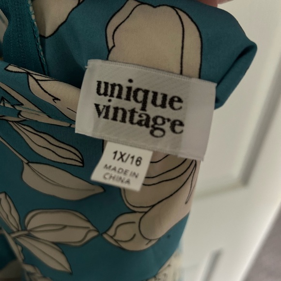 This halter top dress is blue and white floral print and very soft. - Picture 4 of 6